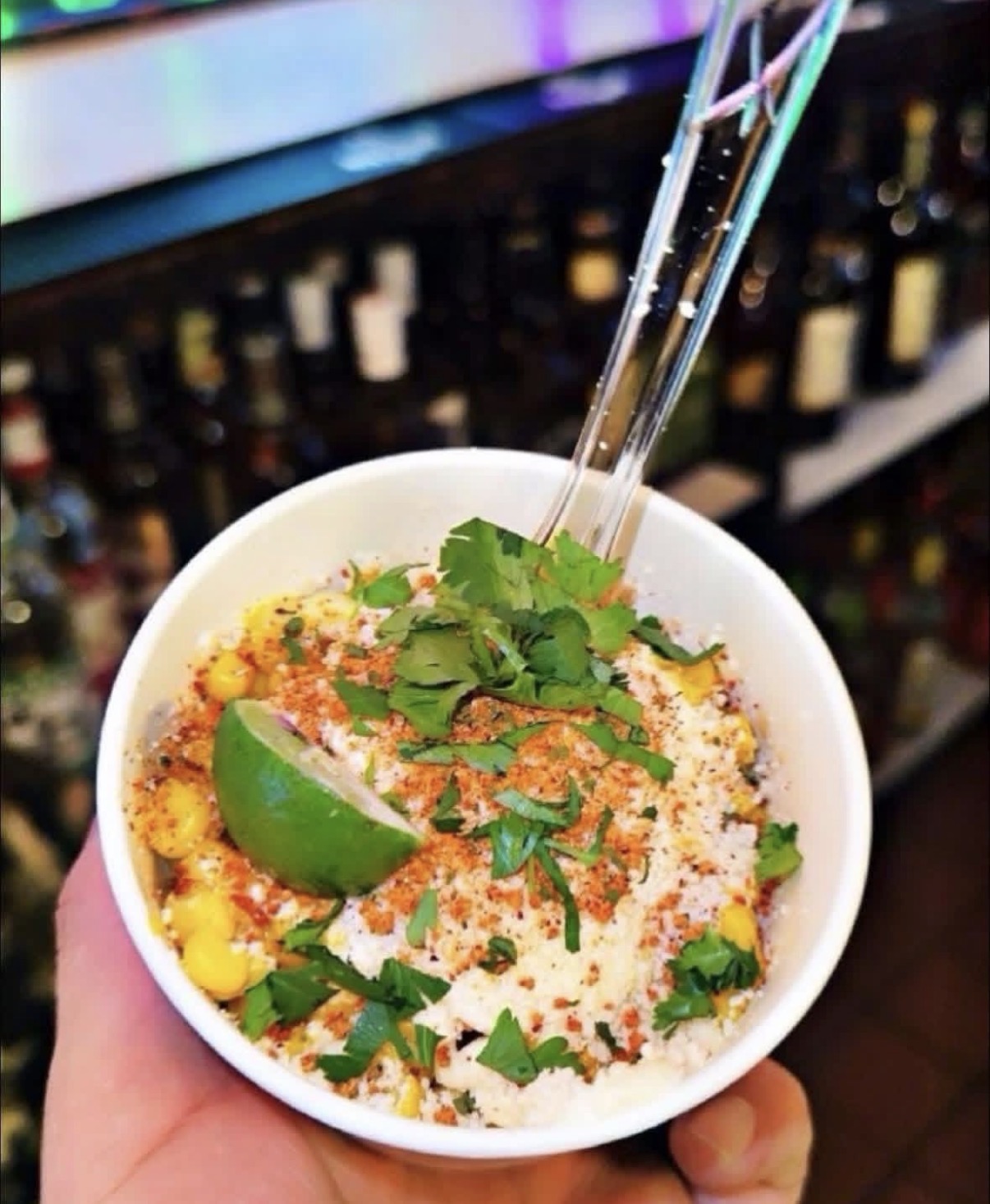 Elote en Vaso — Sweet corn, cotija, crema, chili lime, cilantro